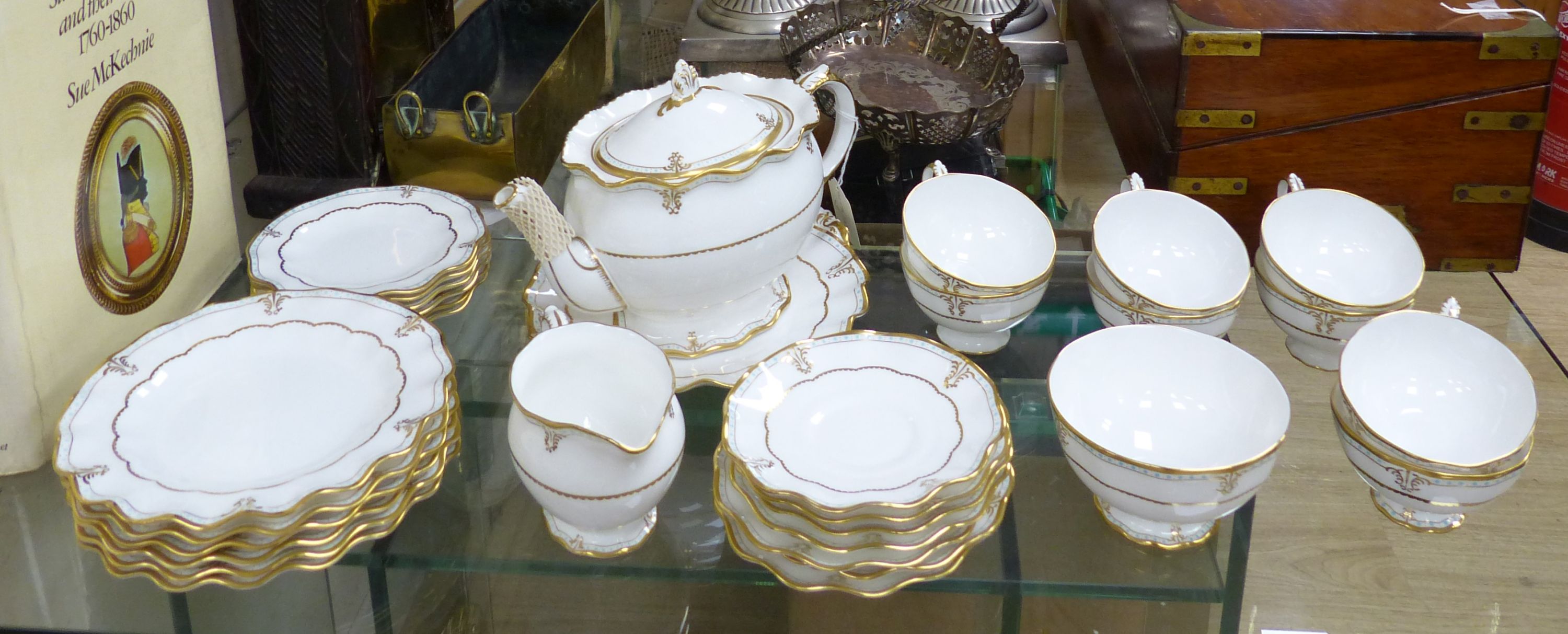A Royal Crown Derby white bone china tea service with gilt and turquoise decoration, Lombardi pattern